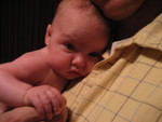 Madison cuddling with Daddy after her bath