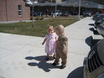Hunter helping Madison out the the car after church with the Michaelis' Family