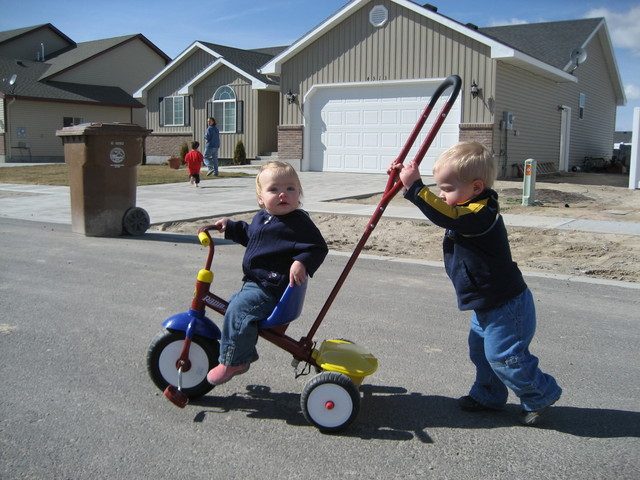 Logan pushed Madison half way around the block to her house