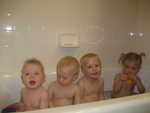 Paul, Gunner, Hunter, and Madison loving bath time
