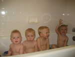 Paul, Gunner and Hunter Michaelis, and Madison enjoying the tubby