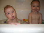 Pauly and Madison playing in the tub - one of the best parts of the day!