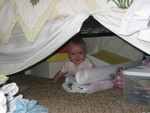 Madison could only crawl backwards and always ended up in odd places she didn't care there was plenty to play with under the bed