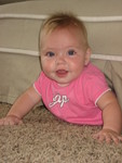 Madison crawling in the only direction she knows, wedged herself under the couch 2