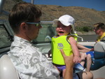 Madison's first time on a boat and to wear a life jacket