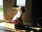 Madison trying on daddy's shoes