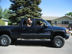 Trevor driving Jordan's truck in the parade