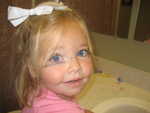 Madison putting on mascara all by herself