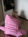 Wanting to wear her favorite pink puffy coat
