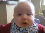 Paul with some of his first foods (Sweet potatoes)