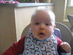 Paul with some of his first foods (Sweet potatoes) 2