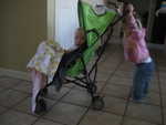 Madison pushing Paul around the house in the stroller - both of them loved it 2