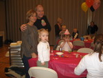 Decorating cupcakes with Grandma and Grandpa Newsome and friend Rylee Weber