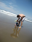 Daddy and Madison playing in the Pacific Ocean