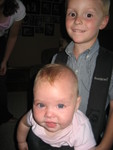 Ethan carrying Madison in the baby Bjorn