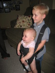 Ethan carrying Madison in the baby Bjorn - Ethan says, she's kinda heavy