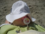 Madison lounging at the Oregon beach