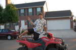 Jordan showing off his 4-wheeler