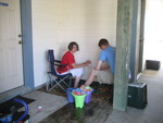 Grandma and Justin filling up water balloons