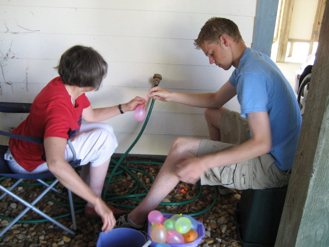 Grandma and Justin getting ready for the water balloon fight