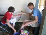 Grandma and Justin getting ready for the water balloon fight