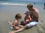 Jordan, Madison and Olivia playing in the sand (notice Madison's feet - she wouldn't let them touch the water or sand)