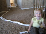 Madison getting a tissue from the bathroom