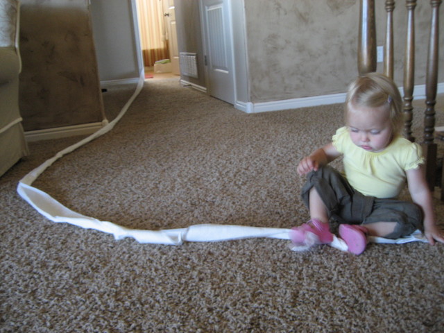 Madison getting a tissue from the bathroom for her nose 2