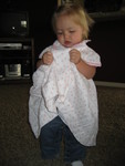 Madison loves to hold up and twirl her princess dress