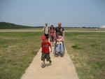 Max, Grandma, Jessica, Ryan, and Jordan going up the path to the Wright brother's monument