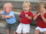 Owen, Madison and Isabell on the steps of the beach house