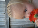 Smelling daisies at Grandma's house 1