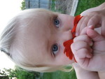 Smelling daisies at Grandma's house 3