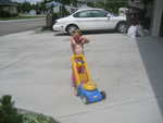 Madison getting ready to mow the lawn