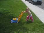 Madison mowing the lawn