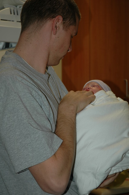 Daddy holding baby Madison