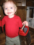 Madison loves to carry around the cheese grater - I think she thinks it's a purse