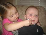 Madison and Paul waiting for Daddy to get home from work 4