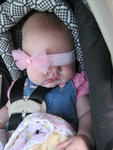 Madison was in her carseat crying and suddenly stopped - I think it's because someone turned out the lights, nap time