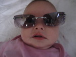 Madison wearing Mommy's sunglasses