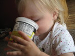 Enjoying a cup of yogurt