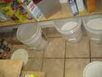Mess found in the pantry after I took a shower - Madison and Paul were both in there playing in rice, flour, and sugar when I discovered the mess