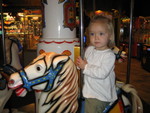 Madison on the carousel in the university mall