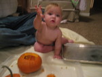 Madison showing Rachel what she found in the pumpkin