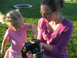 Madison checking out the pictures with aunt Jayne