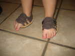 Madison tryingon her tedy bears shoes